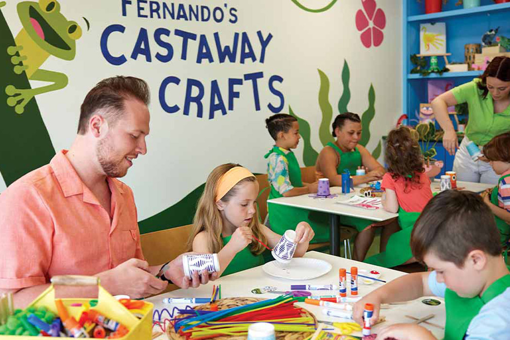 Children and adults enjoying Fernando's Craft Room at Castaway Bay.
